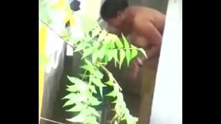 Big boobs Desi bhabhi nude bathing neighbour boy caught by hidden cam